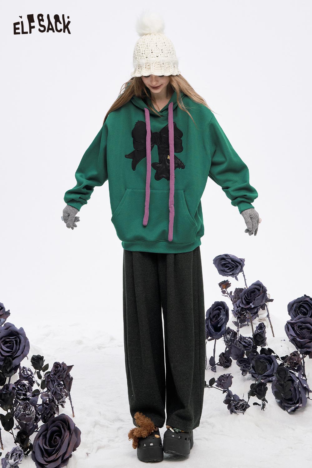 ELFSACK women's wide leg pleated pants styled with a green hoodie and winter accessories