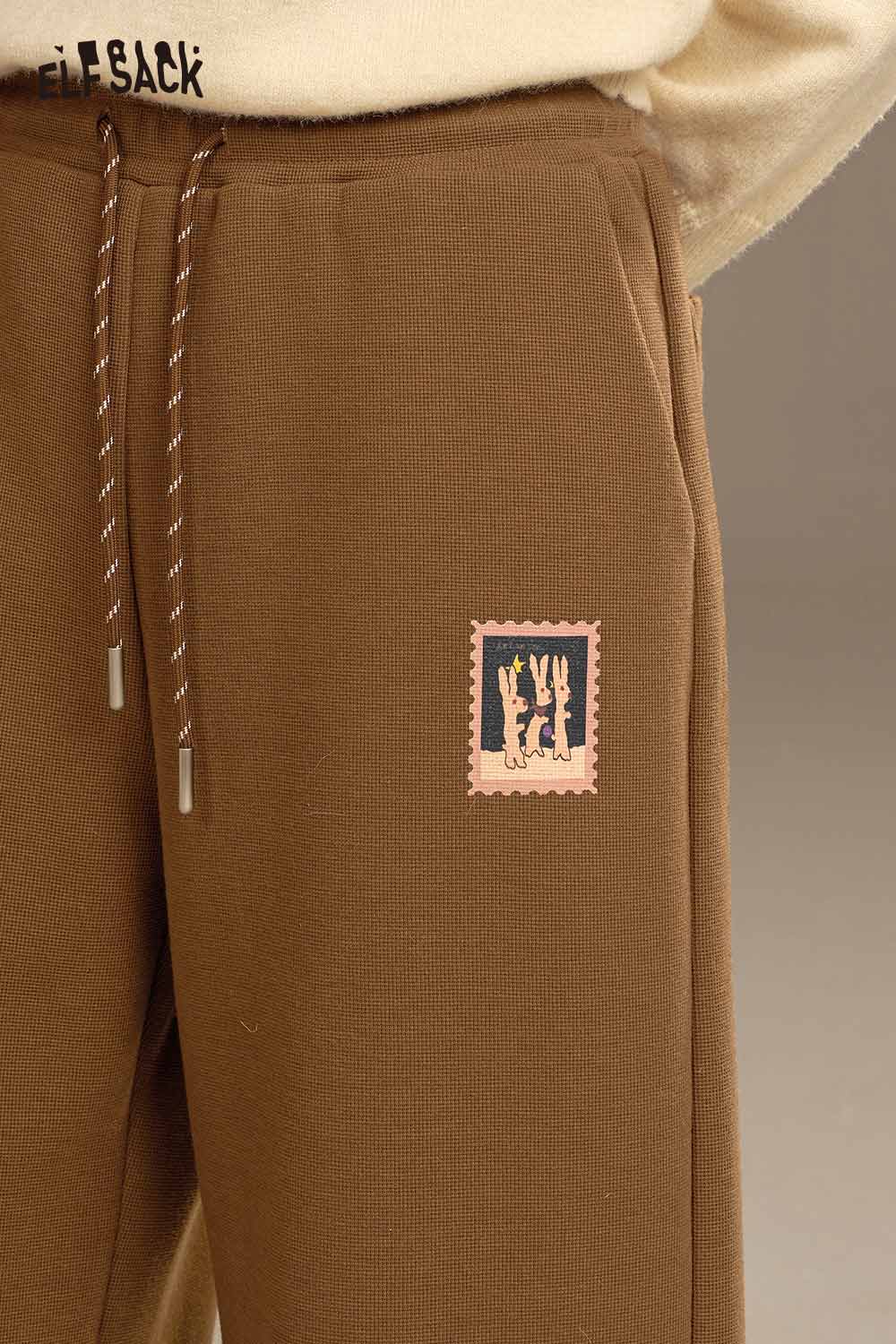 ELFSACK women's wide leg sweatpants in brown with logo detail and side pockets