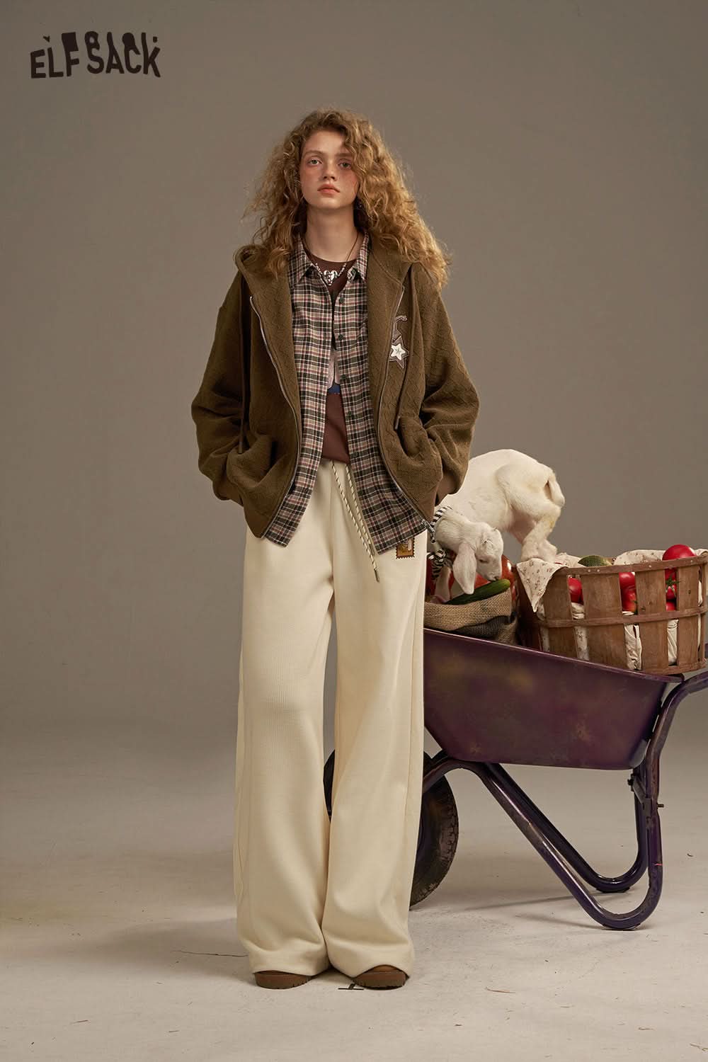 ELFSACK women's wide leg sweatpants in cream, styled with a cozy hoodie and plaid shirt
