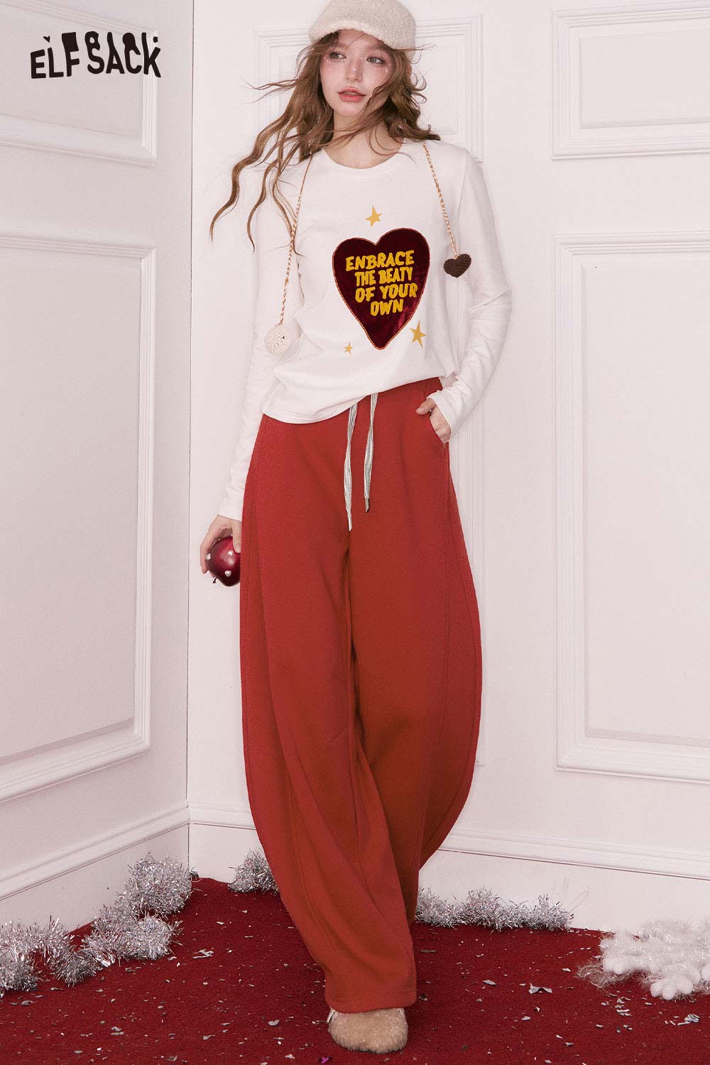 ELFSACK women's wide leg sweatpants in rust color with a comfortable fit for casual wear