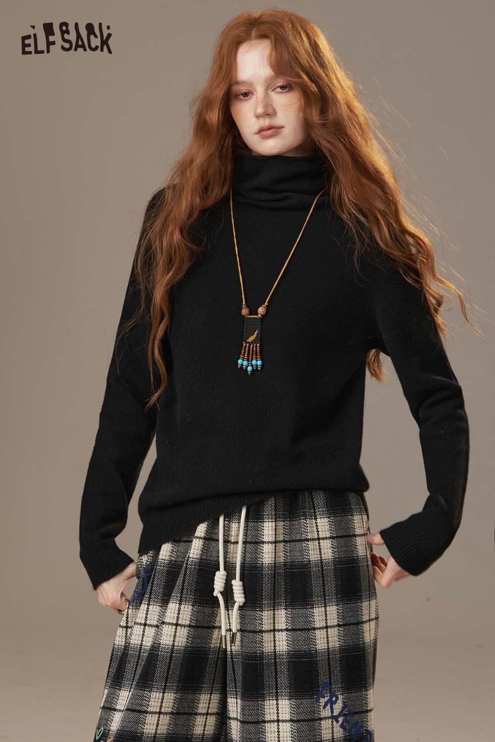 ELFSACK women's wool turtleneck sweater in black, styled with plaid pants for a chic look