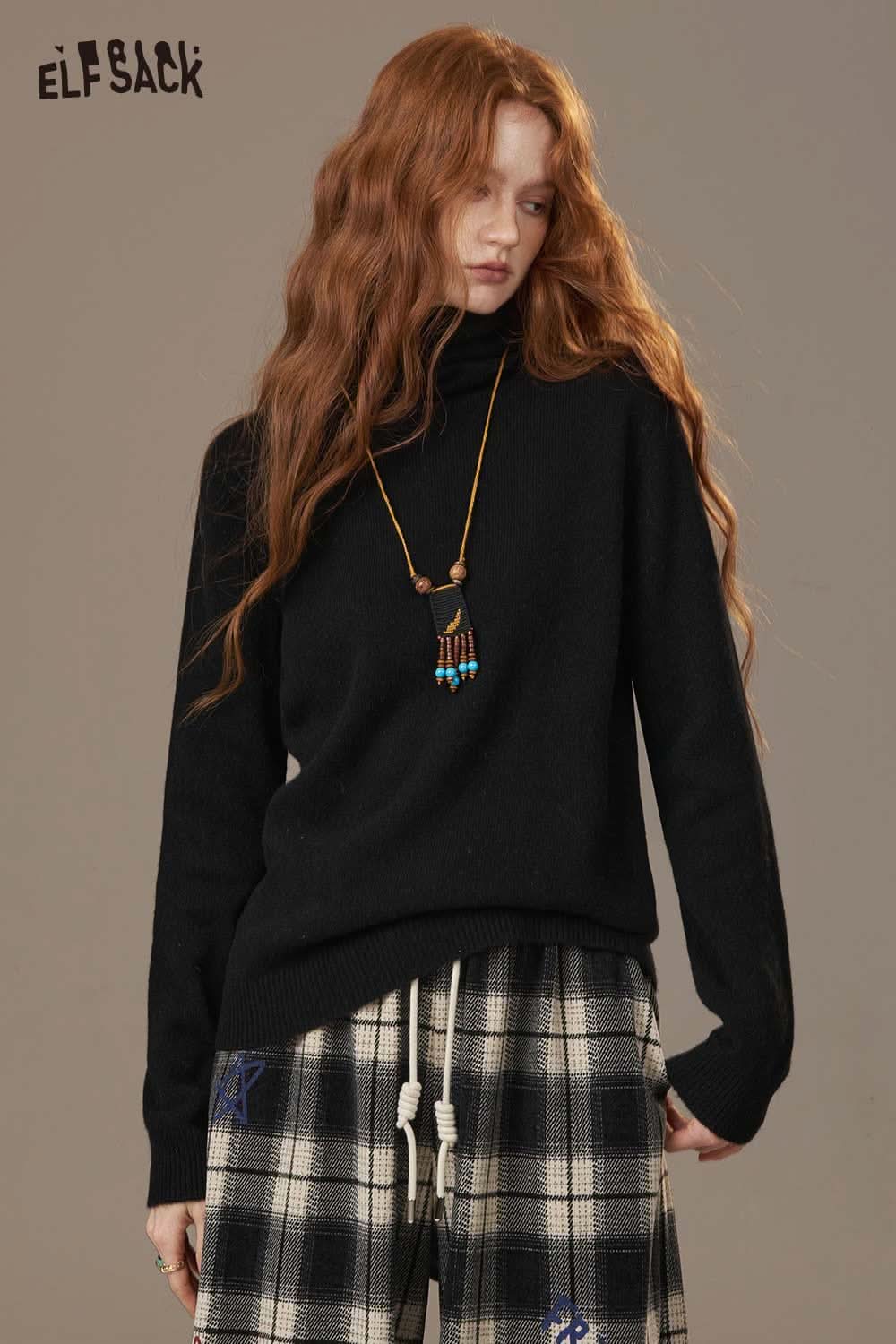 ELFSACK women's wool turtleneck sweater in black, stylishly paired with plaid pants