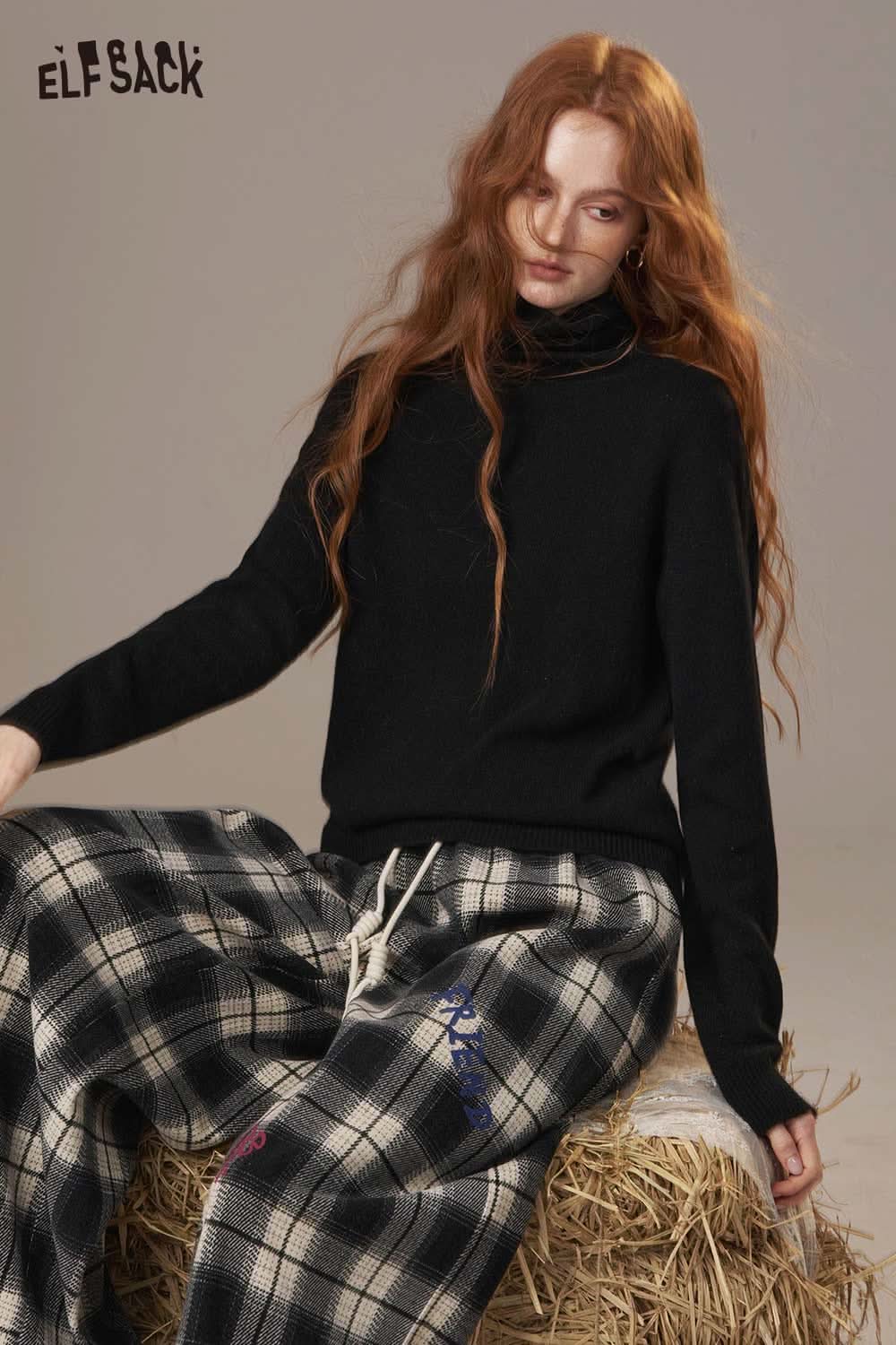 ELFSACK women's wool turtleneck sweater in black, paired with stylish plaid pants for a cozy look