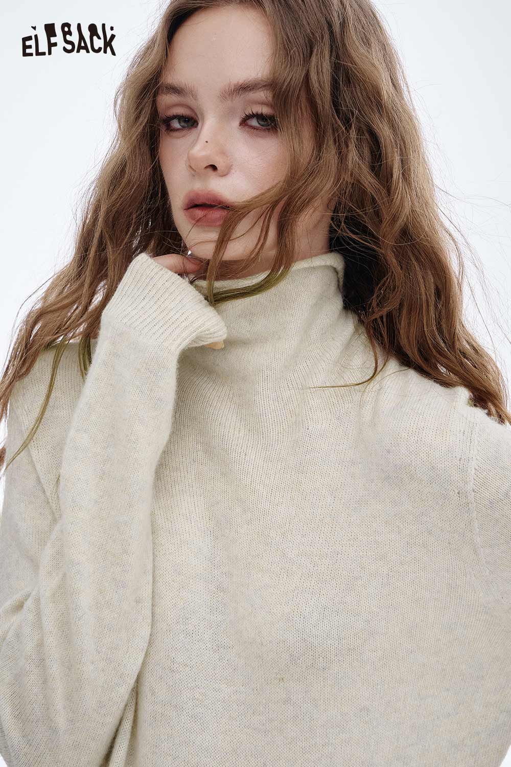 ELFSACK women's wool turtleneck sweater in light cream color with relaxed fit and soft texture