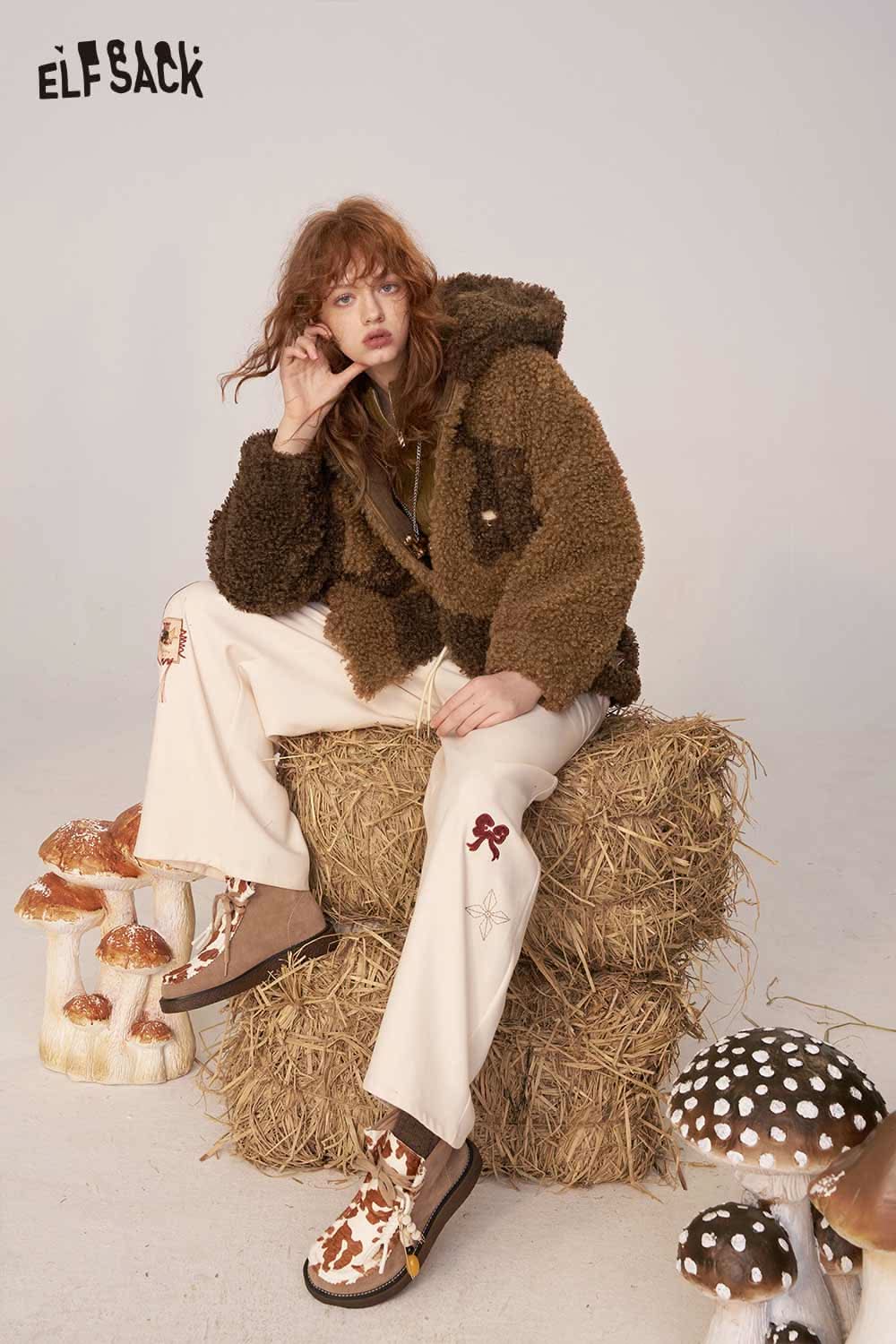 ELFSACK wool blend faux shearling coat styled with cream wide-leg pants and trendy accessories
