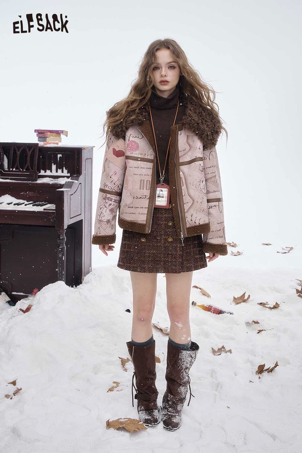 Model wearing a wool high neck sweater women paired with a stylish skirt in a snowy outdoor setting