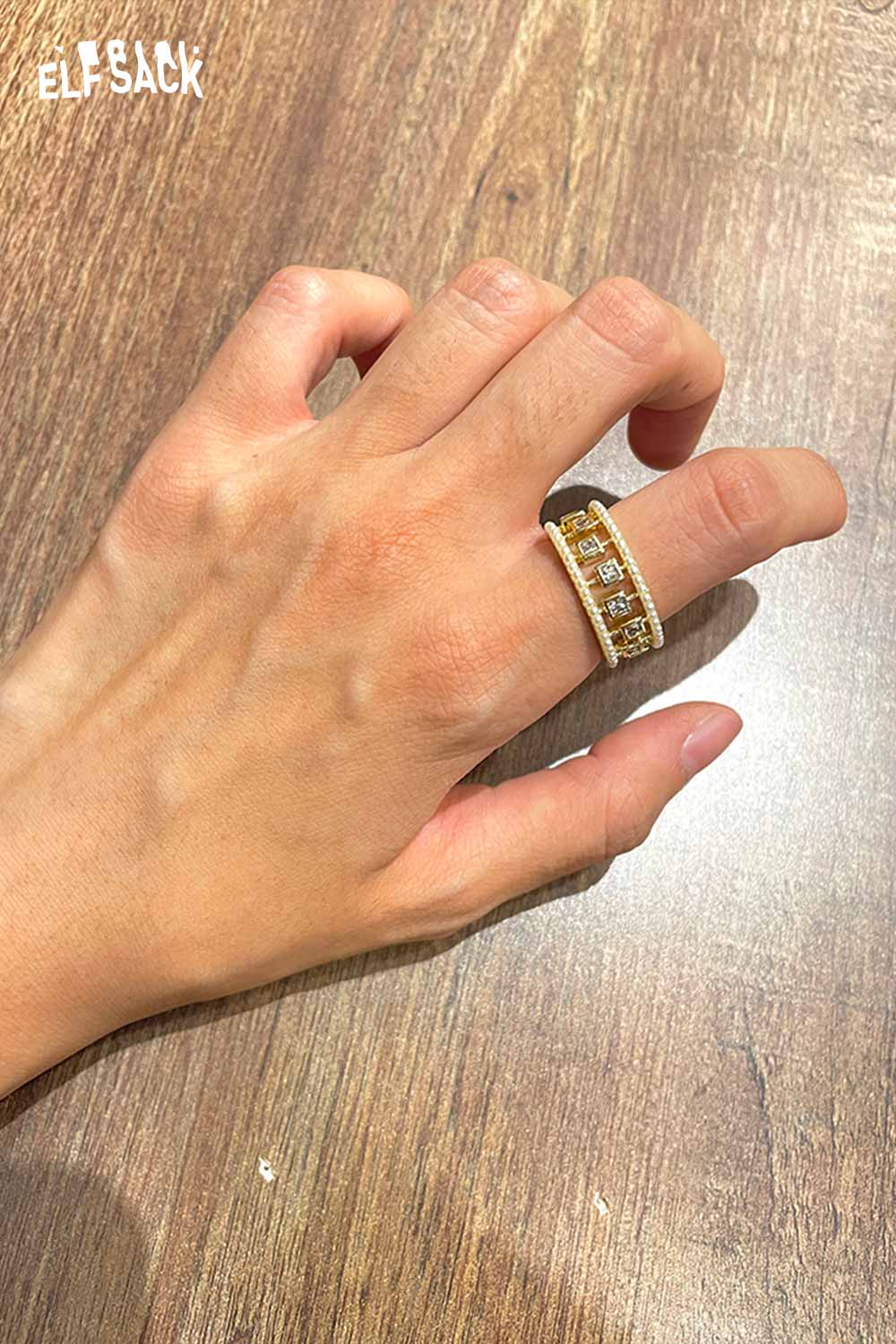 Elegant zirconia gemstone copper ring displayed on a hand, showcasing its sparkling design