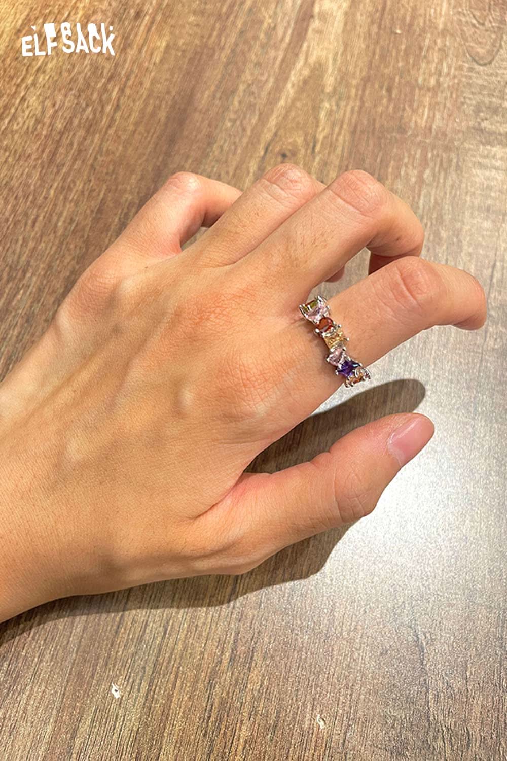 ELFSACK zirconia gemstone copper ring showcased on a hand with stylish design for elegant accessorizing
