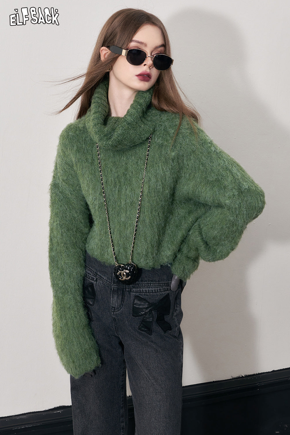 
                  
                    ELFSACK Green Turtleneck Designer Sweater Women 2023 Winter Imitation Camel hair Christmas Knitwears
                  
                