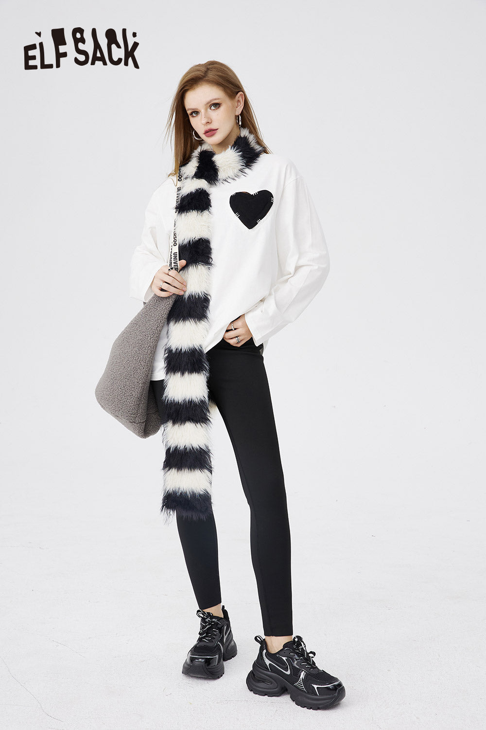 ELFSACK white Cotton Heart Embroidered T-shirt with black heart detail styled with striped scarf and black leggings