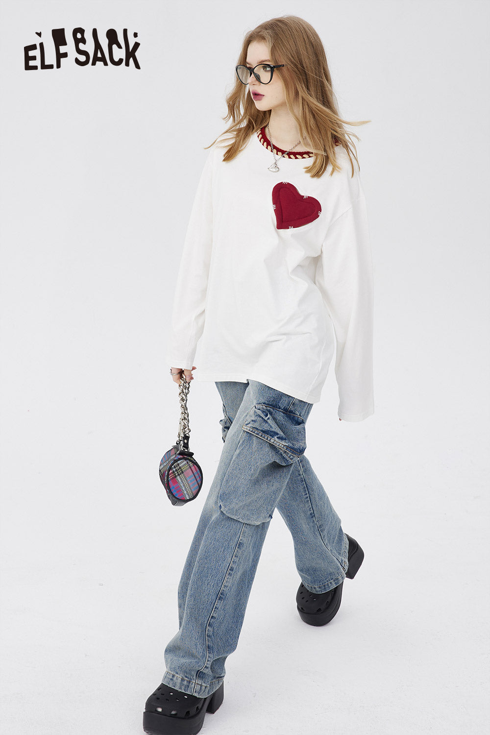 ELFSACK Cotton Heart Embroidered T-shirt in white with red heart detail worn with blue jeans