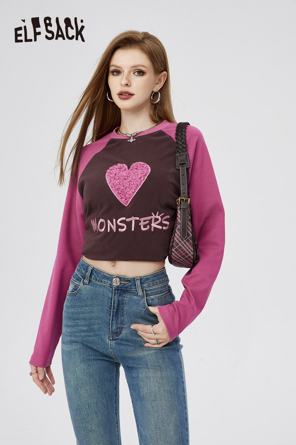 ELFSACK long sleeve cropped t-shirt with pink sleeves and heart graphic on brown body